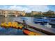 Beautiful lakefront with docks, boats, and waterfront buildings at 59 Desert Ivy Ln, Henderson, NV 89011