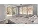 Bright living room with sliding glass doors providing seamless access to the outdoor patio and garden at 59 Desert Ivy Ln, Henderson, NV 89011