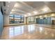 Bright and spacious studio featuring wood floors, ceiling fans, and large windows, perfect for fitness or creative activities at 59 Desert Ivy Ln, Henderson, NV 89011