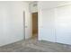 Bedroom featuring sliding closet doors and neutral carpet at 600 N Carriage Hill Dr # 1019, Las Vegas, NV 89138