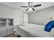 The bedroom features a ceiling fan and lots of room for furniture at 6520 Ouida Way, Las Vegas, NV 89108