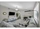 Bright living room features a cozy fireplace, a sectional sofa, and hardwood floors at 6520 Ouida Way, Las Vegas, NV 89108