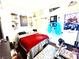 Bedroom with hardwood flooring, decor and a gaming-themed design at 6819 Mahogany Meadows Ave, Las Vegas, NV 89122