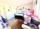 Bright bedroom features wood flooring, closet, and a bright window at 6819 Mahogany Meadows Ave, Las Vegas, NV 89122