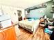 Bedroom featuring hardwood flooring, a queen-sized bed and a decor at 6819 Mahogany Meadows Ave, Las Vegas, NV 89122