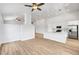 Bright living area showcasing the open floor plan and eat in kitchen, with modern appliances at 689 Hitchen Post Dr, Henderson, NV 89011