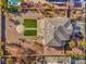 A bird's eye view shows the detailed landscaping, hardscape and custom design details that make this backyard an entertainer's dream at 6971 Cedar Basin Ave, Las Vegas, NV 89142