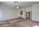 Large bedroom with a ceiling fan and doorway leading to a bathroom at 6971 Cedar Basin Ave, Las Vegas, NV 89142