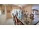 Elegant dining room with a glass table, chandelier, and decorative window treatments at 6971 Cedar Basin Ave, Las Vegas, NV 89142