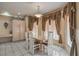 Inviting dining room features decorative window coverings, and a table with seating for four at 6971 Cedar Basin Ave, Las Vegas, NV 89142