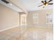 Living room has tile floors, archways and large windows at 6982 Mirkwood Ave, Las Vegas, NV 89178