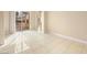 Bright living room features tile flooring and sliding glass doors at 6982 Mirkwood Ave, Las Vegas, NV 89178