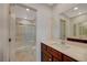 Bright bathroom with vanity, shower, and modern fixtures at 757 Omaggio Pl, Henderson, NV 89011