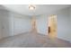 Bedroom featuring neutral carpet, light gray walls, and a closet at 757 Omaggio Pl, Henderson, NV 89011