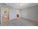 Spacious bedroom featuring neutral carpet and light gray walls at 757 Omaggio Pl, Henderson, NV 89011