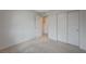 Bedroom with light gray walls, carpeting, white trim and doors, and closet at 757 Omaggio Pl, Henderson, NV 89011