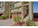 Modern three-story home with a two-car garage, desert landscaping, and a covered front entry at 7953 Mountain Lilac St, Las Vegas, NV 89113