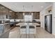Spacious kitchen with a large island, stainless steel appliances, and ample counter space at 7953 Mountain Lilac St, Las Vegas, NV 89113