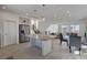 Bright, open kitchen adjacent to the dining and living spaces, perfect for modern living and entertaining guests at 7953 Mountain Lilac St, Las Vegas, NV 89113