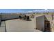 This home features a gorgeous roof deck with outdoor furniture and amazing views at 7953 Mountain Lilac St, Las Vegas, NV 89113