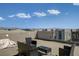 This roof deck features plenty of room to relax with stunning panoramic views at 7953 Mountain Lilac St, Las Vegas, NV 89113