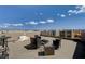 Enjoy gorgeous views from this spacious roof deck with outdoor furniture at 7953 Mountain Lilac St, Las Vegas, NV 89113