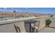 This roof deck features a bistro set and a potted plant with amazing views at 7953 Mountain Lilac St, Las Vegas, NV 89113