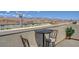 Relaxing rooftop deck with chairs and a table, perfect for enjoying panoramic mountain views at 7953 Mountain Lilac St, Las Vegas, NV 89113
