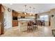 Spacious kitchen with island, granite countertops, and stainless steel appliances at 8113 Bay Colony St, Las Vegas, NV 89131