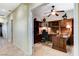 Spacious home office featuring dark wood built-ins and natural light from the window at 8113 Bay Colony St, Las Vegas, NV 89131