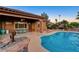 Inviting in-ground pool, patio, and outdoor dining area, perfect for entertaining and relaxing at 8113 Bay Colony St, Las Vegas, NV 89131