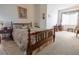 Comfortable bedroom features a wooden bed frame with a view of the bright window at 928 Collingtree St, Las Vegas, NV 89145