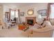 Cozy living room showcases a fireplace, plush seating, and elegant decor at 928 Collingtree St, Las Vegas, NV 89145