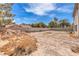 Large backyard ready for landscaping, offering ample space for outdoor activities at 1009 Nawkee Dr, North Las Vegas, NV 89031