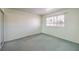 Spacious bedroom features a window for natural light and a large sliding door closet at 1009 Nawkee Dr, North Las Vegas, NV 89031