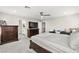 Bedroom with dark wood furniture and neutral carpeting at 10101 Heron Lake Ave, Las Vegas, NV 89178