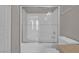 Bright bathroom featuring a shower and bath with glass door at 10550 W Alexander Rd # 2064, Las Vegas, NV 89129
