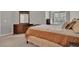 Bright bedroom with neutral walls, carpet, and bedding at 10550 W Alexander Rd # 2064, Las Vegas, NV 89129