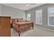Bedroom with neutral walls, carpet, a ceiling fan and bright natural light at 10550 W Alexander Rd # 2064, Las Vegas, NV 89129