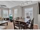 Comfortable living space with a dining table, modern entertainment center and natural lighting at 10550 W Alexander Rd # 2064, Las Vegas, NV 89129