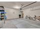 Spacious garage interior featuring ample storage racks and space for multiple vehicles at 10550 W Alexander Rd # 2064, Las Vegas, NV 89129