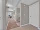 Hallway with an office nook, neutral walls, and carpet flooring at 10550 W Alexander Rd # 2064, Las Vegas, NV 89129