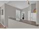 Bright kitchen featuring tile floors, a breakfast bar, and standard white appliances at 10550 W Alexander Rd # 2064, Las Vegas, NV 89129