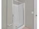 Enclosed glass standing shower with tiled walls at 10550 W Alexander Rd # 2064, Las Vegas, NV 89129