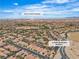 Aerial view showcases the property's location near South Point Casino and the surrounding community at 11076 Zampino St, Las Vegas, NV 89141