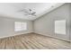 Spacious bedroom featuring light wood flooring, lots of natural light and a ceiling fan at 1110 Azure Heights Pl, Las Vegas, NV 89110