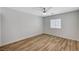 This bedroom features hardwood floors and a ceiling fan for a modern touch at 1110 Azure Heights Pl, Las Vegas, NV 89110