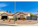 Attractive single-story home with desert landscaping, a red tile roof and gated driveway at 1110 Azure Heights Pl, Las Vegas, NV 89110