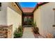 Covered front entry features a double door and decorative stone accents at 1110 Azure Heights Pl, Las Vegas, NV 89110