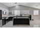 Contemporary kitchen featuring sleek cabinetry, stainless steel appliances, and an island with counter seating at 1110 Azure Heights Pl, Las Vegas, NV 89110